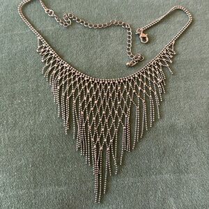 Silver statement piece fringe necklace